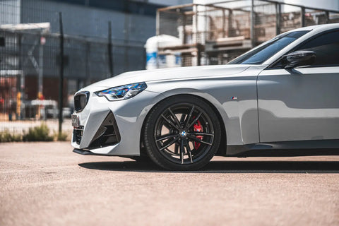 Silver BMW M240i with black wheels and red brake calipers on Masata BMW G42 Performance Lowering Springs